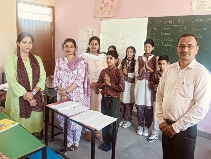 In the summer camp, children are learning Telugu along with their own language.